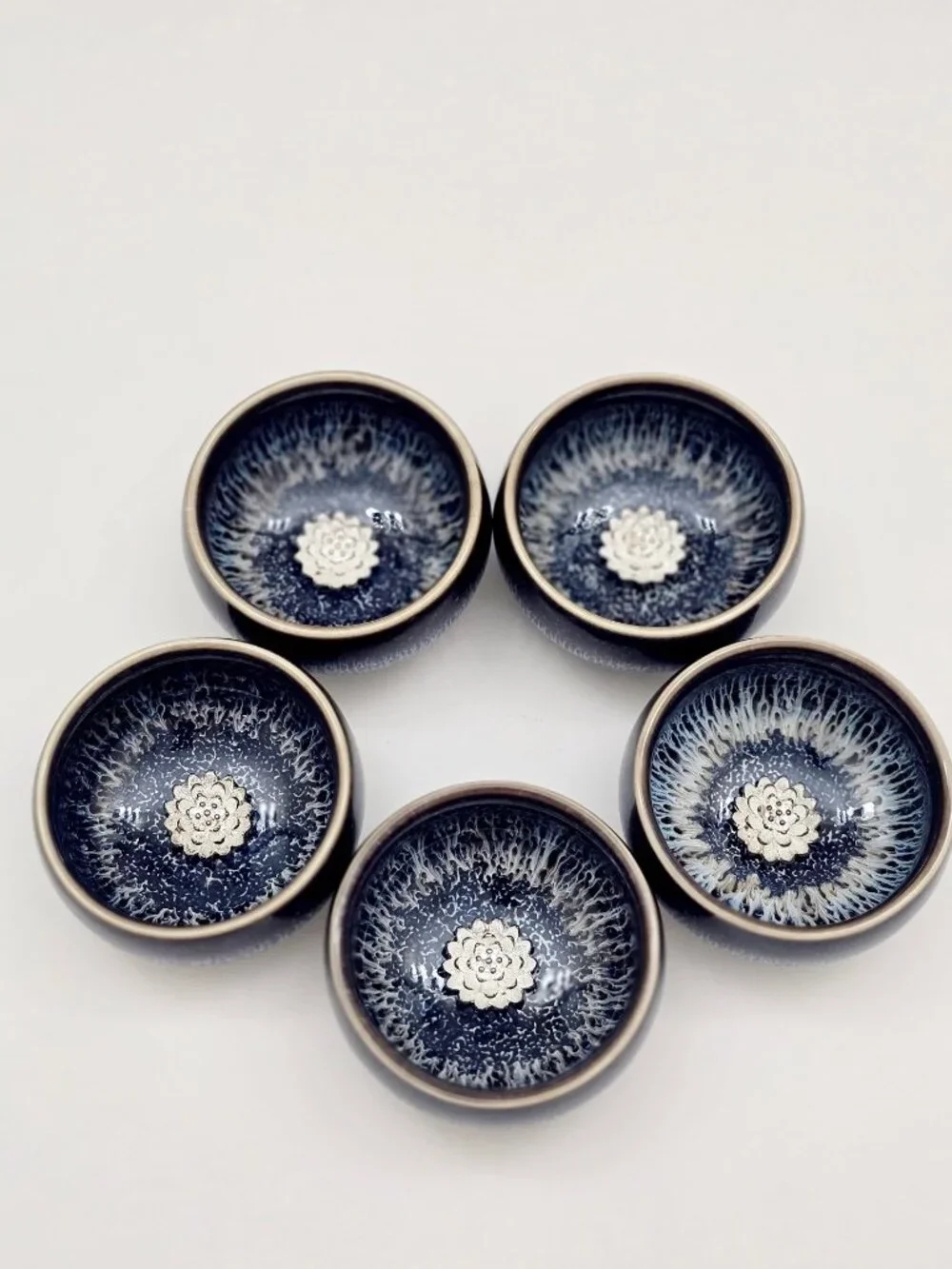 Set of 5 Jianzhan-Style Ceramic Tea Cups with Silver Lotus